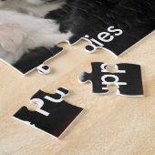 Cinq chiots maltais sur un puzzle (Côté)