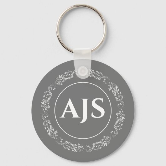 Cirkelvormig ontwerp met Monogramm. Sleutelhanger (Voorkant)