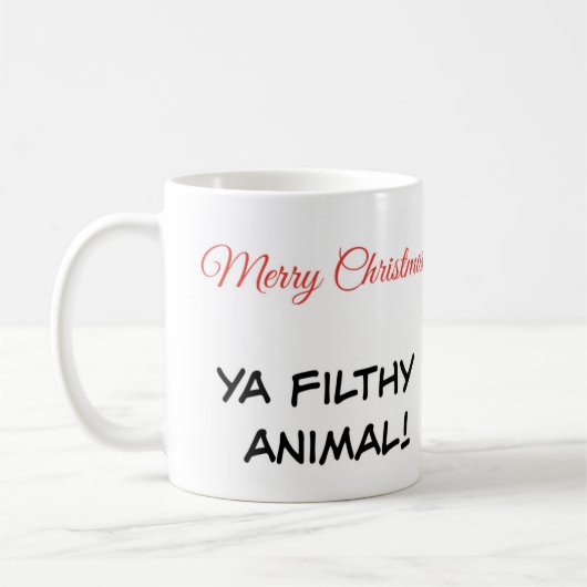 Citation de Mug "Joyeux Noël Ya Animal pourri" (Gauche)