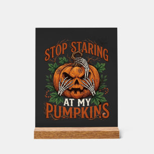 Citrouilles qui arrêtent de fixer Halloween Mains