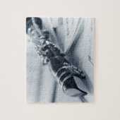 Clarinet on Music Sheets Legpuzzel (Verticaal)