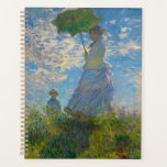 Claude Monet Femme avec un parasol<br><div class="desc">Organisez la vie avec l'élégance impressionniste. Ce planificateur présente la Femme de Claude Monet avec un Parasol, brillant avec des verts frais, des bleus aérés et des blancs doux. Les coups de pinceau gracieux apportent calme et inspiration à la planification quotidienne. Rempli de pages pour suivre les tâches, les objectifs...</div>