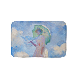 Claude Monet - Vrouw met een parasol naar links Badmat