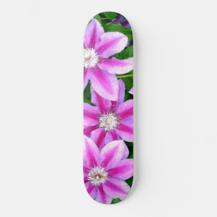 Clematis, roze bloemen skateboard