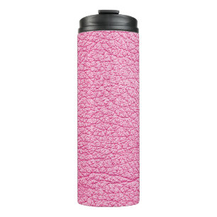 Close-up roze leer, gestructureerde achtergrond. thermosbeker