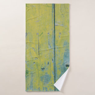 Closeup photo of yellow and teal wooden board