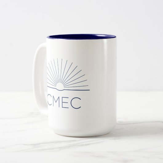 CMEC Tweekleurige Mok - 15 oz, marine logo en inte (Voorkant links)