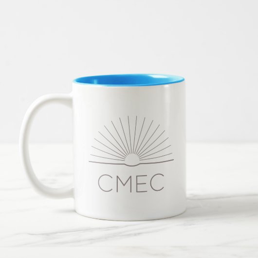 CMEC Tweekleurige Mok - grijs logo, turquoise inte (Links)