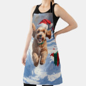 Cockapoo hardlopen in de sneeuw met kerst Pet Schort (Insitu)