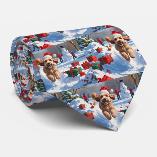 Cockapoo Rent in de Sneeuw met Kerstmuts Stropdas (Opgerold)