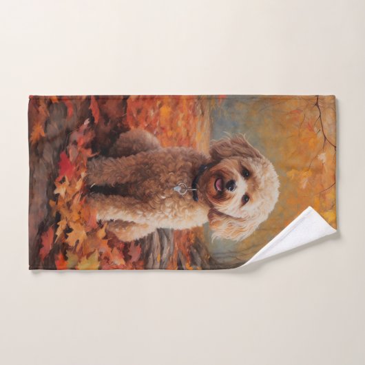 Cockapou dans les feuilles d'automne automne autom (Serviette à main)