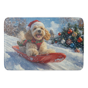 Cocker Spaniel-hond in slee laat het sneeuwen Kers Badmat