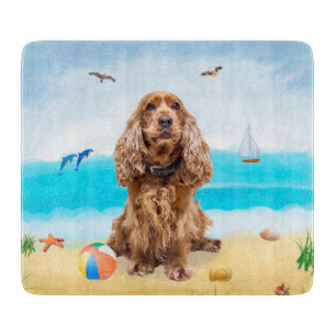 Cocker Spaniel hond op het strand Snijplank