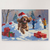Cocker Spaniel loopt in de sneeuw met kerst Pet Legpuzzel (Horizontaal)