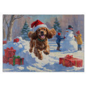 Cocker Spaniel loopt in de sneeuw met kerst Pet Snijplank (Voorkant)