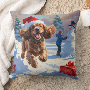 Cocker Spaniel rent in de sneeuw met kerstmuts Kussen