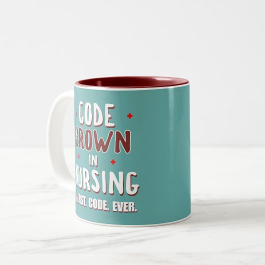 Code Bruin Verpleegkunde Slechtste Code ooit Tweekleurige Koffiemok (Voorkant links)