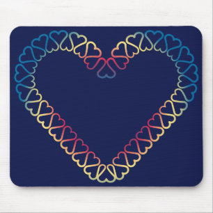 coeur cyan jaune rouge sur tapis de souris