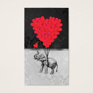 Coeur mignon d'éléphant et d'amour sur le gris