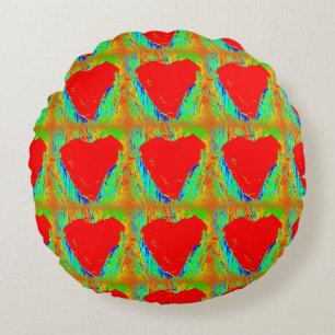 coeur rouge sur coussin vert rond