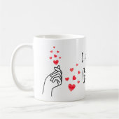 Coeurs de doigt d'amour rouge tasse de café (Gauche)