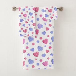 Cœurs roses et bleus sur fond blanc.