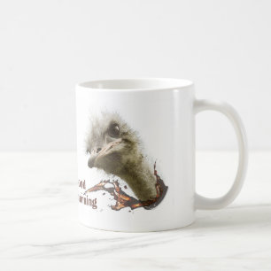 Coffe mug with ostrich plashing coffee