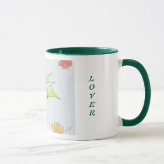 Colibri dans la tasse de fleurs