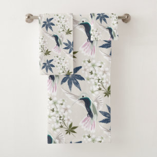 Colibris et fleurs blanches.