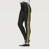 Collants noirs à rayure latérale blanche et jaune  (Gauche)