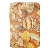 Collectie van de zeeschelp op de strandbak badmat (Voorkant Verticaal)