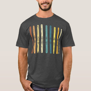 Collectie van skischoenen t-shirt