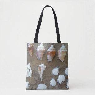 Collectie van verschillende zeeschelpen op een can draagtas