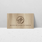 Rustiek hout-gebrande gestempeld monogram op bruin visitekaartje