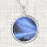 Collier Amour subtil Bleu Lumières Petite Stérling<br><div class="desc">Diverses nuances de lumières bleues avec "amour" dans le script et les initiales, décorent ce élégant 0, 75" Sterling Silver charme rond plaqué pour lui ou elle (le texte sera petit). Modifiez le texte et les initiales à l'aide du Modèle fourni. La chaîne de 18" est équipée d'un fermoir à...</div>