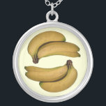 Collier de bananes<br><div class="desc">Un pendentif comportant deux images d'un groupe de bananes.</div>