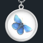 Collier de peinture papillon bleu<br><div class="desc">Beau papillon bleu peint en aquarelle et gouache par l'artiste Sarah Trett.</div>