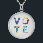 Collier En Argent Voter Moderne Modèle Floral Multicolore Politique<br><div class="desc">Sortez du vote cette année électorale avec ce collier magnifique et amusant ! Les lettres du mot "vote" sont composées d'un motif abstrait moderne,  fleuri,  dans les tons bleu,  vert,  jaune,  rose et orange. Fait un merveilleux cadeau pour l'activiste,  la politico ou l'étudiant dans votre vie.</div>