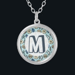 Collier Joli Blue Shell Starfish Motif Monogramme<br><div class="desc">Ajoutez votre propre monogramme / initial à ce joli coquillage bleu et crème et motif d'étoiles de mer. Il évoque des images de la plage et de l'été. Il y a cinq variétés de coquillages dans la conception et une étoile de mer. Parfait pour la mer / plage / océan...</div>