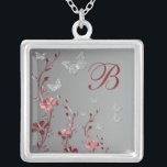 Collier Monogramme Floral Rouge et Argent<br><div class="desc">Ce collier floral rouge et argent avec papillons argentés et monogramme correspond au faire-part de mariage ci-dessous et ferait un joli cadeau pour vos demoiselles d'honneur,  servante d'honneur et fille aux fleurs. Changez simplement le "B" à l'initiale dont vous avez besoin.</div>