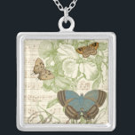 Collier Papillons sur Partition avec Design Floral<br><div class="desc">Un design floral vert et de la partition font arrière - plan à un trio de papillons dans cette pièce de Vision Studio. Le mot français papillon est également emblaqué au fond de la pièce. Si vous aimez les papillons, la nature, ou tout comme vous entourer de beauté, c'est l'impression...</div>