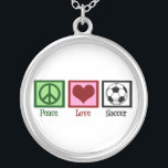 Collier Peace Love Soccer<br><div class="desc">Un signe de paix,  un coeur et un ballon de football.</div>