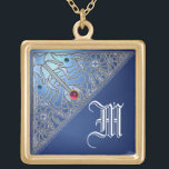 COLLIER PLAQUÉ OR MONOGRAMME DE SAPHIRE BLEU DES DRAGONS DE MER<br><div class="desc">Dragons jumeaux d'imaginaire médiéval avec une pierre à gemme bleu 3D brillante.</div>
