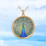 Collier Plaqué Or Plumage bleu Peacock<br><div class="desc">Faites une déclaration de mode avec cette chaîne de collier argenté sterling avec pendentif conçu pour elle qui présente l'image d'un Peacock bleu avec des plumes fantastiques colorées. Un design fun et tendance ! Sélectionnez la forme,  la taille et le style de finition de votre pendentif.</div>