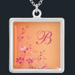 Collier rose et orange floral monogramme<br><div class="desc">Ce collier floral orange et rose avec papillons et monogramme correspond au faire-part de mariage ci-dessous et ferait un cadeau de femme de chambre,  une bonne d'honneur cadeau,  et un cadeau de fille de fleurs. Changez simplement le "B" à l'initiale dont vous avez besoin.</div>
