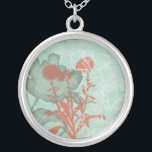 Collier Silhouette de Fleurs rouges sur Arrière - plan Tur<br><div class="desc">Trois fleurs rouges contrastent avec un arrière - plan turquoise dans ce tableau de Megan Meagher. Une silhouette d'une autre fleur se penche à gauche de l'impression. Un morceau simple avec beaucoup de choses en cours. Cela ferait un beau cadeau pour un ami ou aimé qui aime l'art!</div>