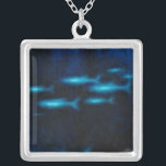 Collier Silhouettes de poisson bleu translucide<br><div class="desc">Ce dessin animé d'un groupe de poissons translucides bleus nageant sera un grand ajout à n'importe quel produit Zazzle et apportera une grande pop de couleur. Prenez-le aujourd'hui !</div>