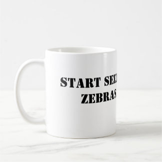 Commencez à voir la tasse de zèbres