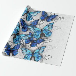 Compositie van witte en blauwe vlinders cadeaupapier