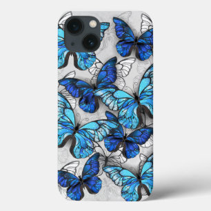 Compositie van witte en blauwe vlinders iPhone 13 hoesje